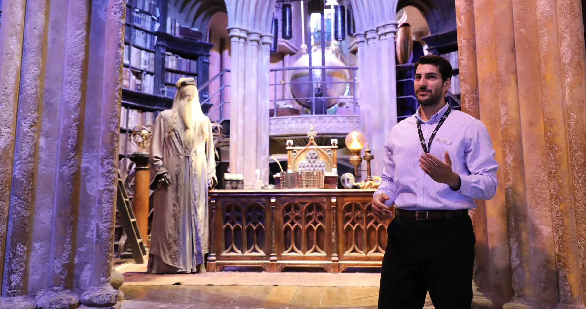 Careers Hero - Staff member in Dumbledore's office set at Warner Bros. Studio Tour London