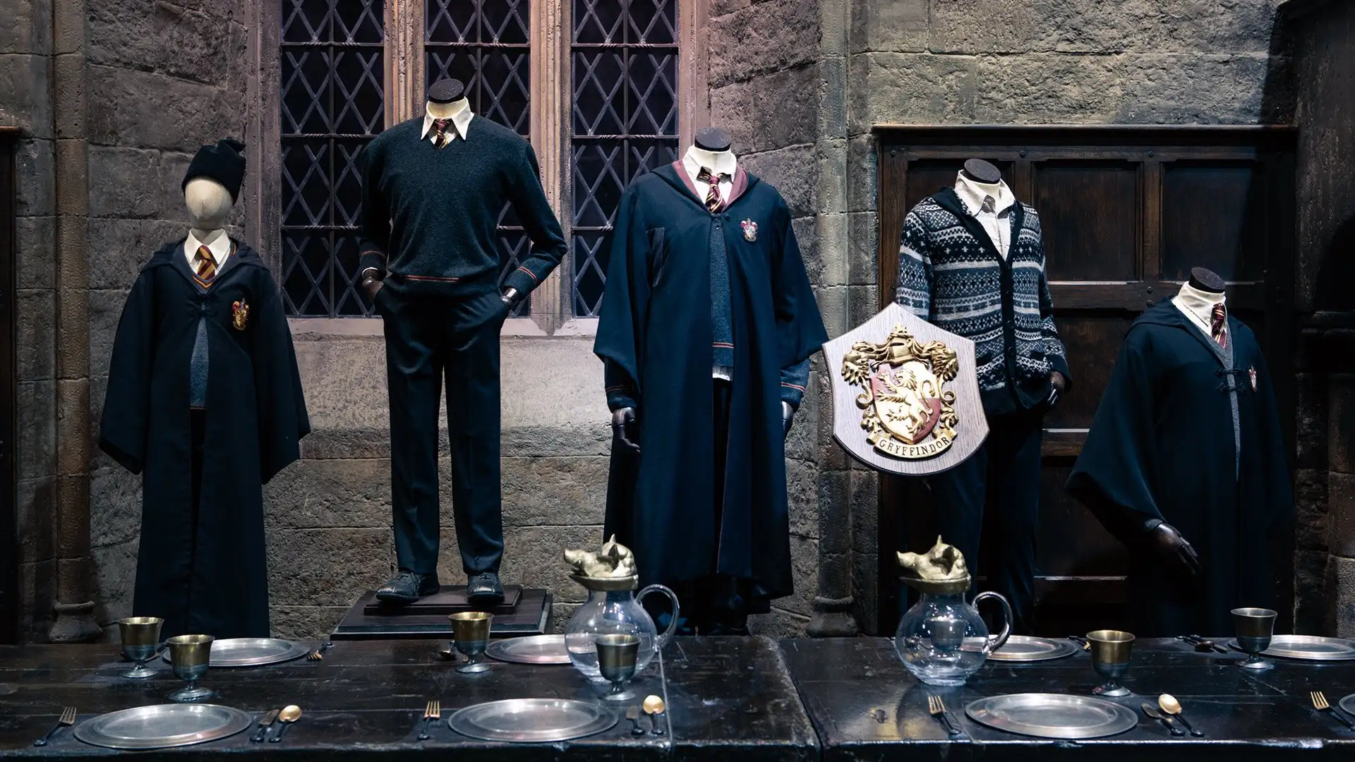 Gryffindor costumes in the Great Hall set at Warner Bros. Studio Tour London