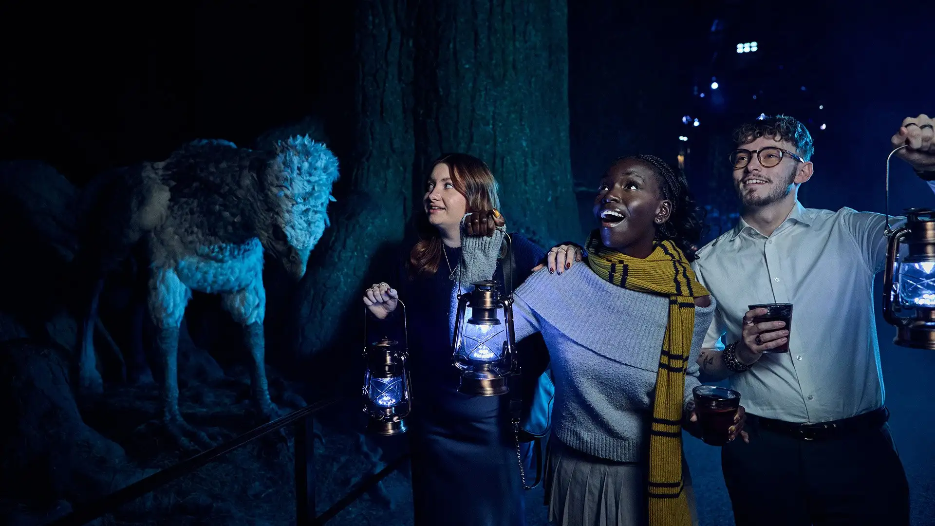Nox - A group of visitors int he Forbidden Forest holding lanterns