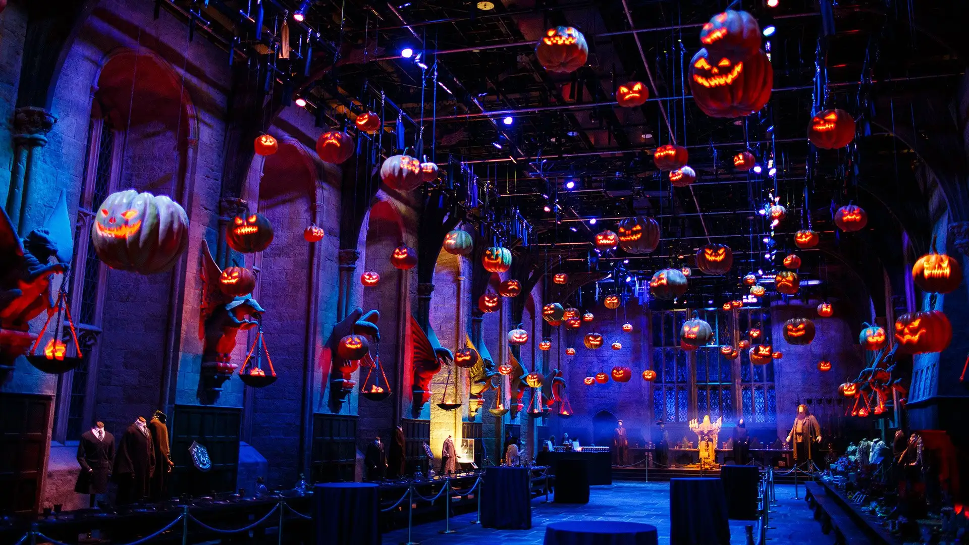 Nox - The Great Hall set dressed for Halloween with 100 floating pumpkins